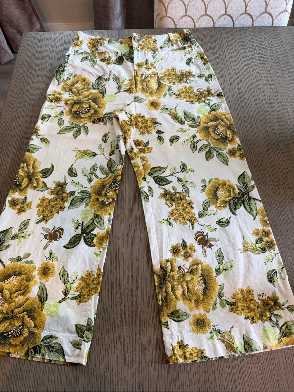 Anthropologie 
Maeve Floral Wide Leg Pants in White with Green & Brown Accents